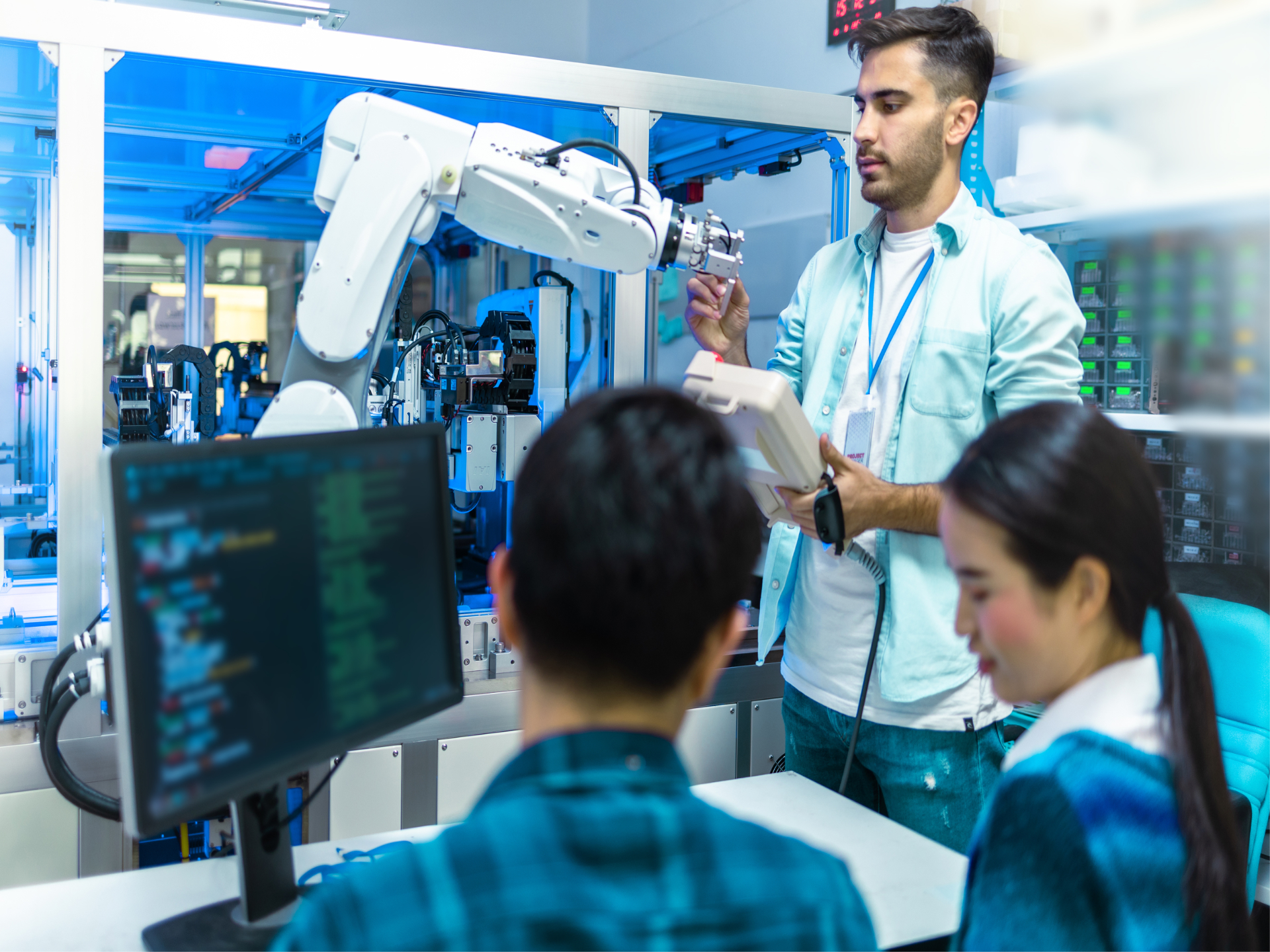 Meeting asian Engineers Maintenance Robot Arm at Lab. they are i